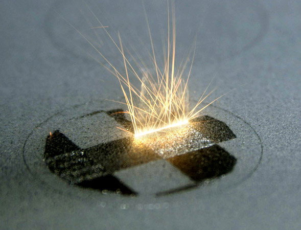 Metal Undergoing Additive Manufacturing Process